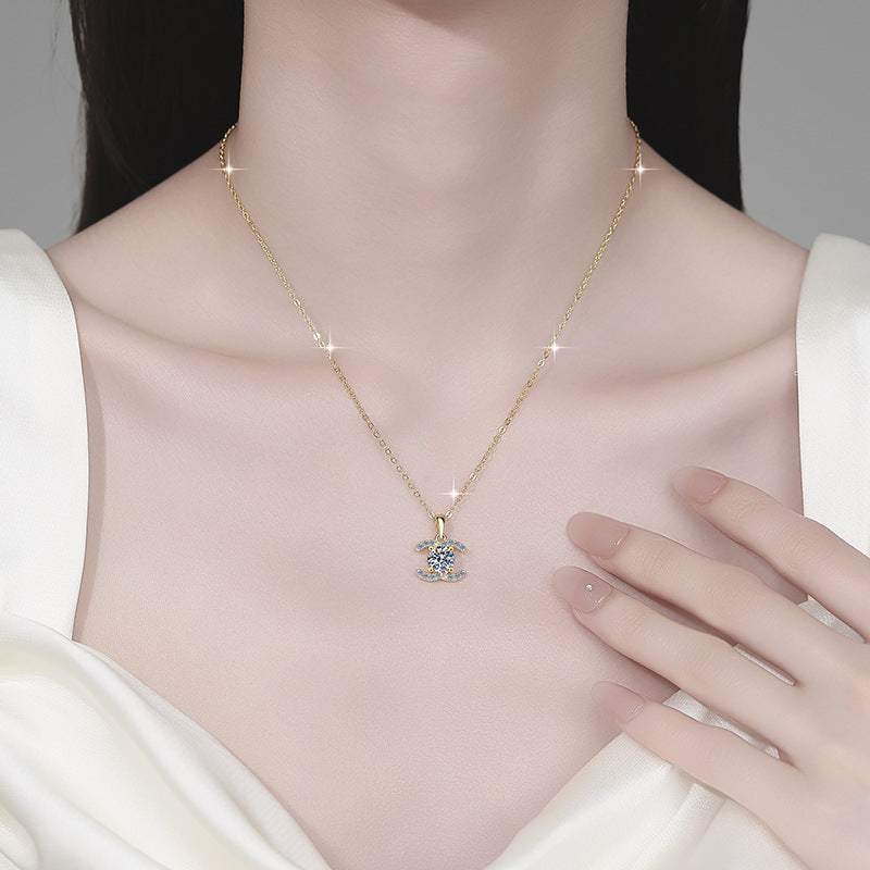 Damen Halskette mit funkelndem Kristall-Anhänger und eleganter Designfassung Shop Nory