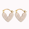 Damen Ohrstecker in Herzform mit elegantem Goldrahmen Shop Nory