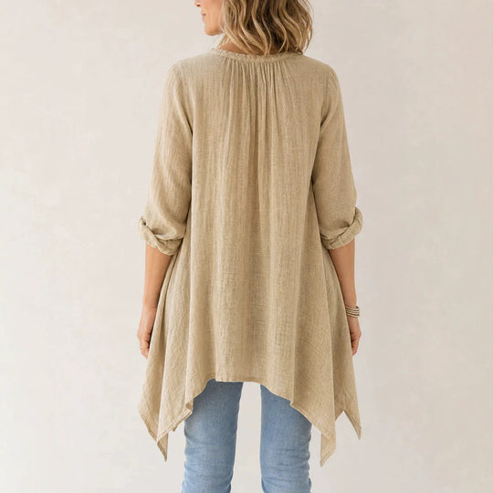 Damen Lässige Tunika-Bluse mit asymmetrischem Saum, feiner Waffelstruktur und Kellerfalten Shop Nory