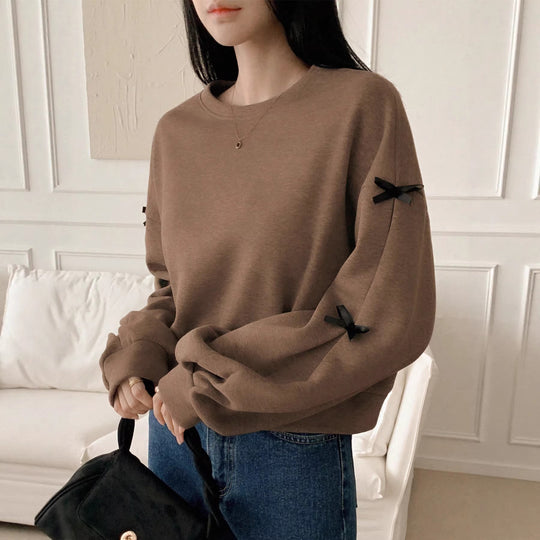 Damen Oversize‑Sweatshirt mit dekorativen Schleifenärmeln und Rundhalsausschnitt Shop Nory