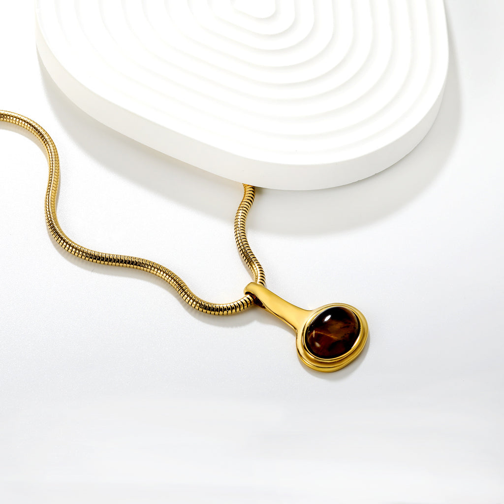 Damen elegante Halskette mit edlem Tigerauge-Anhänger und hochwertigem Goldfinish Shop Nory