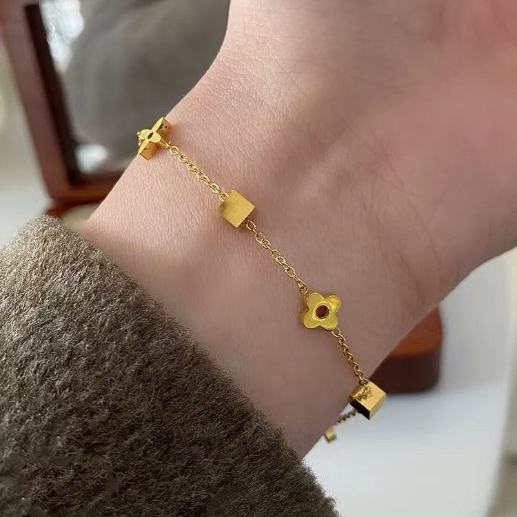 Damenschmuck Armband mit goldplattiertem Charme Kette Shop Nory