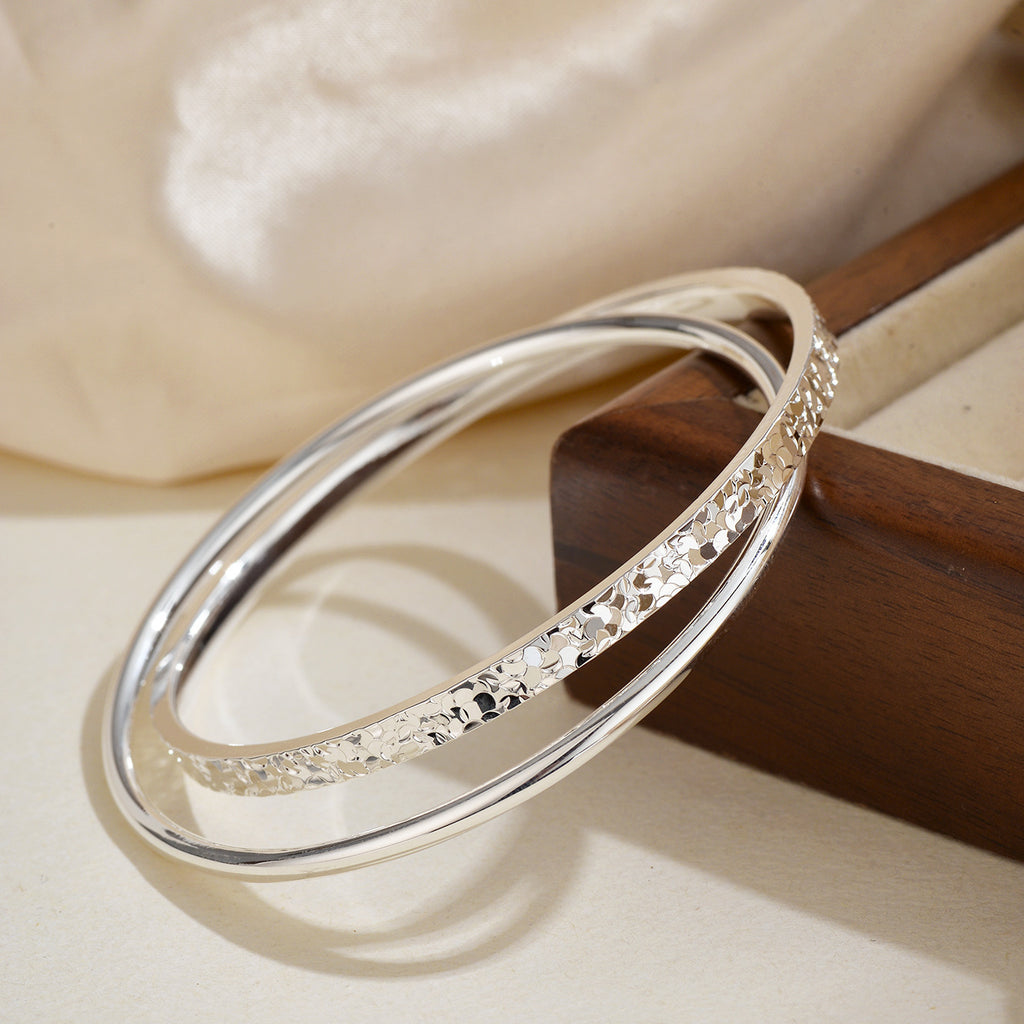 Damen eleganter Armreif mit kunstvollem Design Shop Nory
