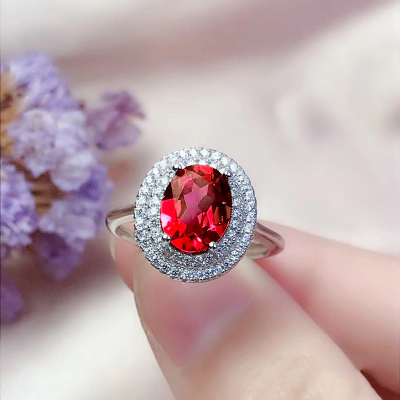 Damen Zierlicher Ring mit ovalem, strahlendem Edelstein und funkelndem Zirkonia-Besatz Shop Nory