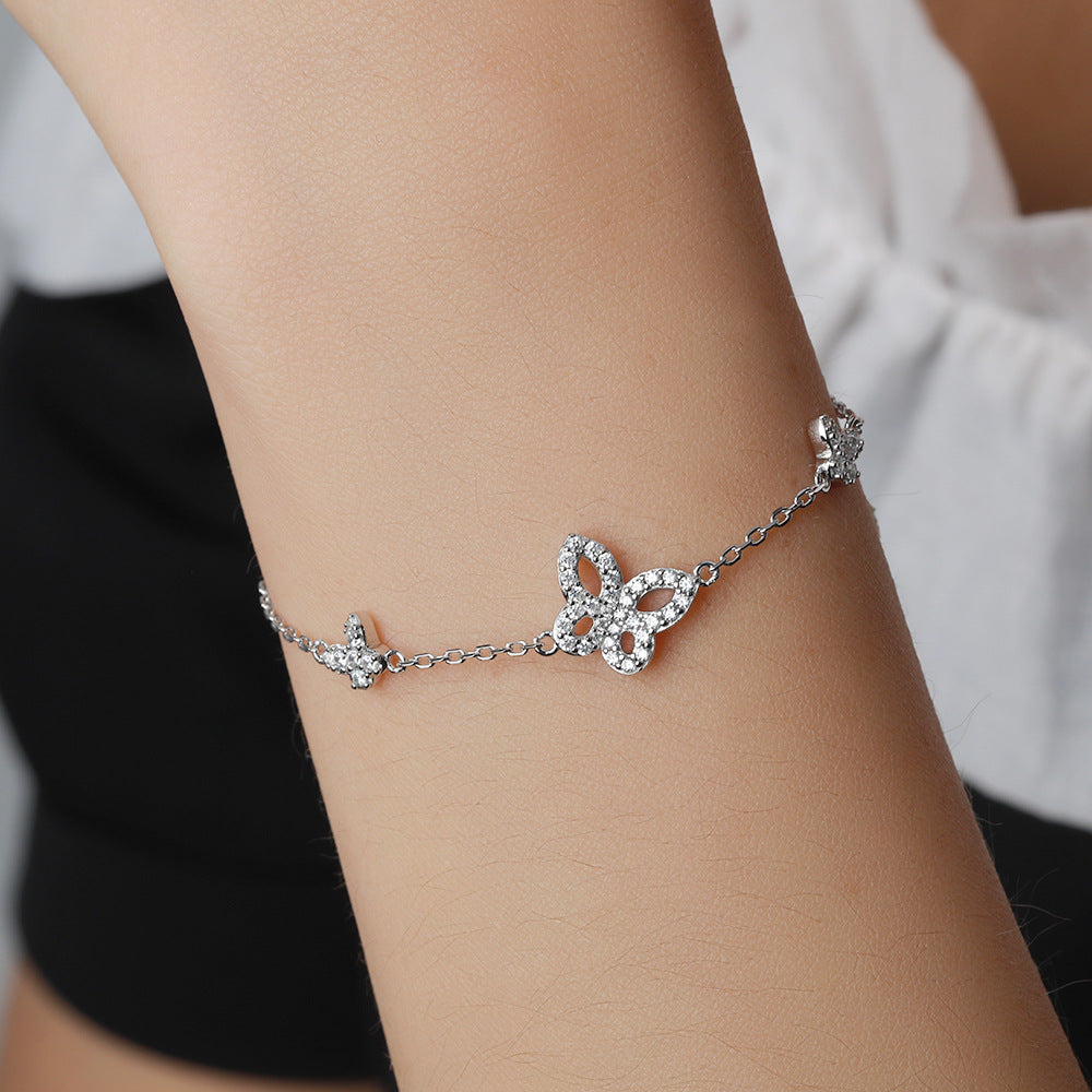 Damenarmband mit verspieltem Blütenmuster und funkelndem Zirkonia-Besatz Shop Nory