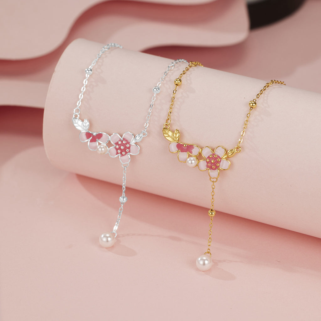 Damen filigrane Halskette mit floralen Anhängern und eleganter Perlenverzierung Shop Nory