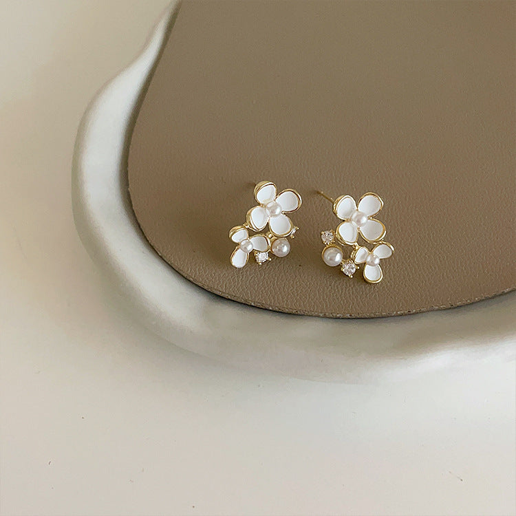 Damen Ohrringe mit floralem Design und perlverzierten Akzenten Shop Nory