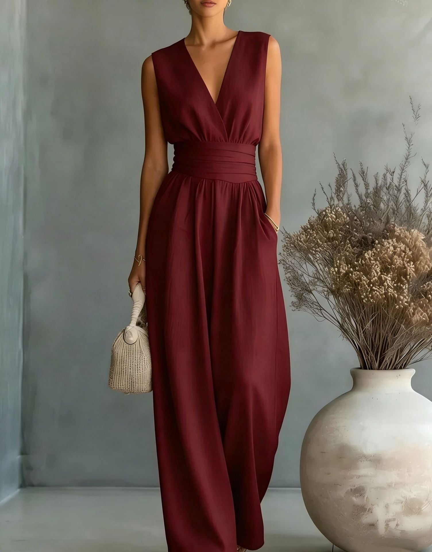 Eleganter Ärmelloser Jumpsuit mit Tiefem V-Ausschnitt, Taillenbund und Weitem Bein