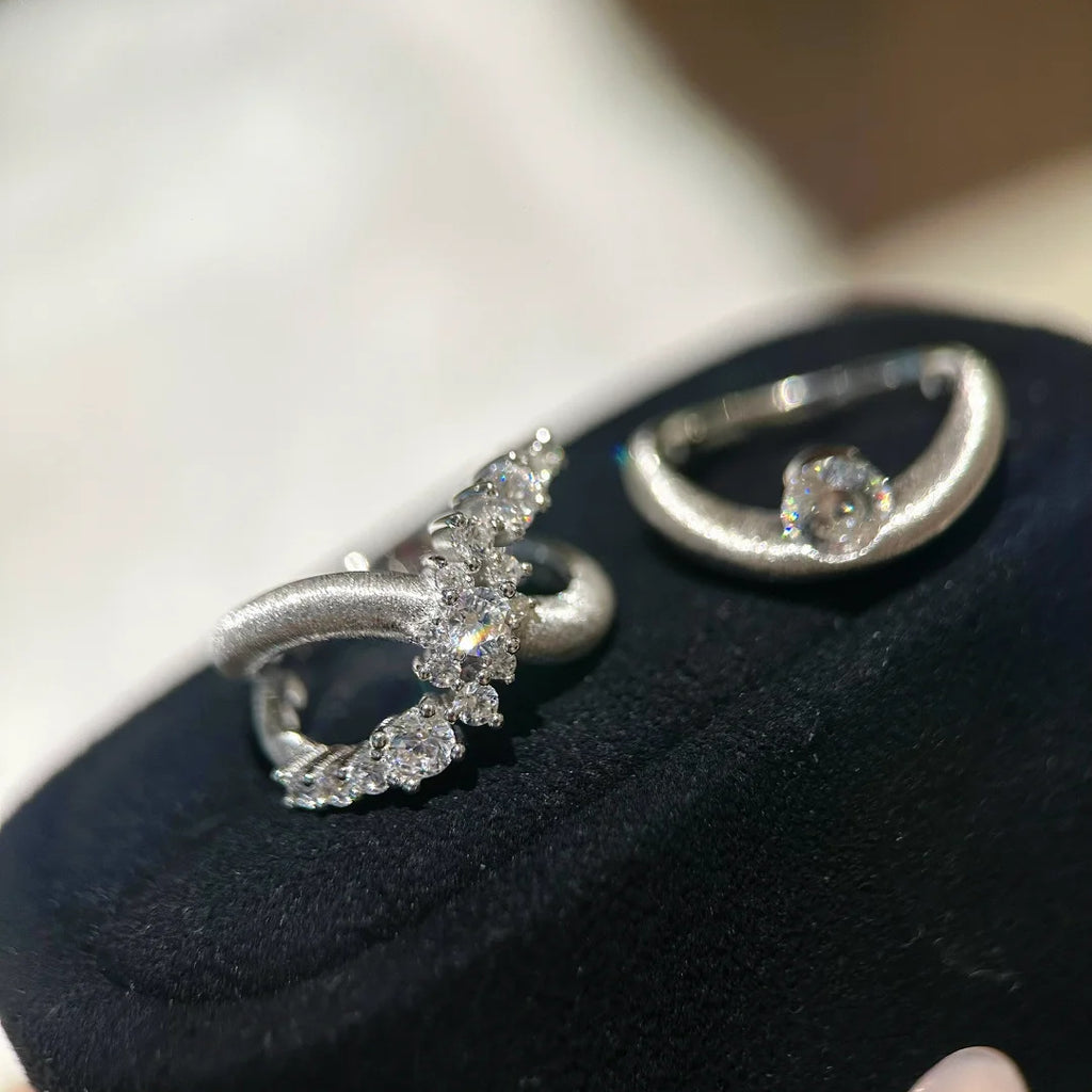 Damens Ring mit elegantem verlaufendem Design und funkelndem Zirkonia Shop Nory