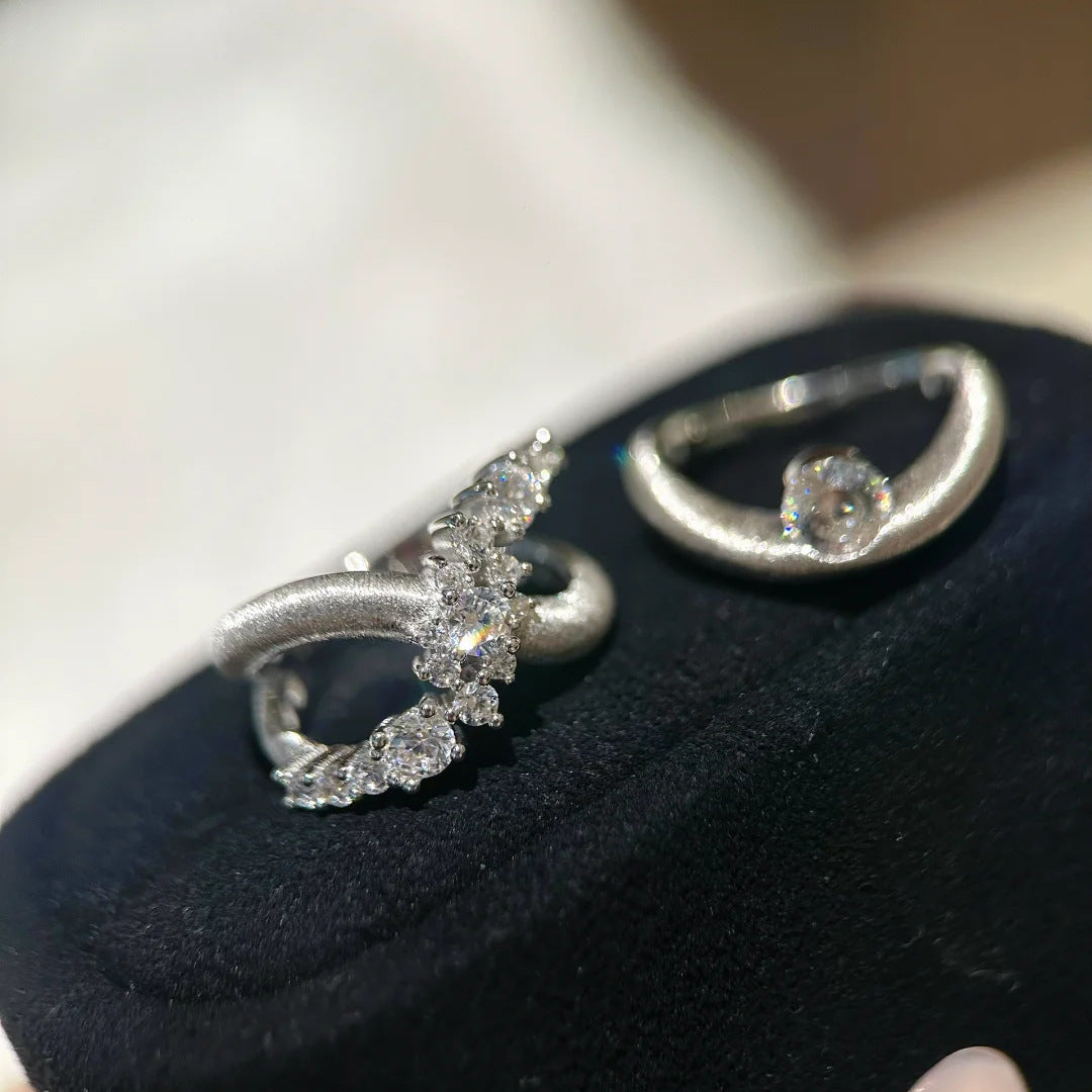 Damens Ring mit elegantem verlaufendem Design und funkelndem Zirkonia Shop Nory