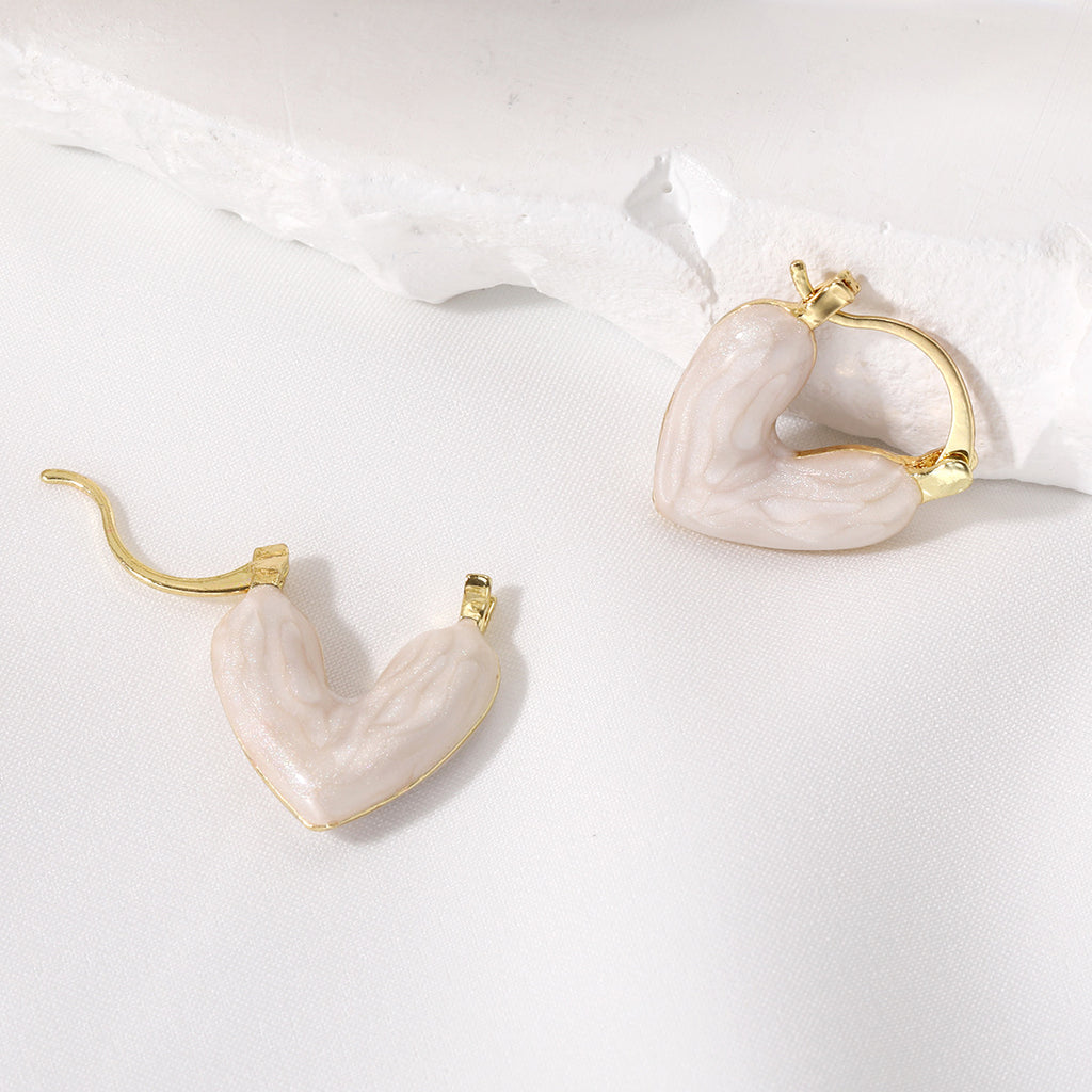 Damen Ohrstecker in Herzform mit elegantem Goldrahmen Shop Nory