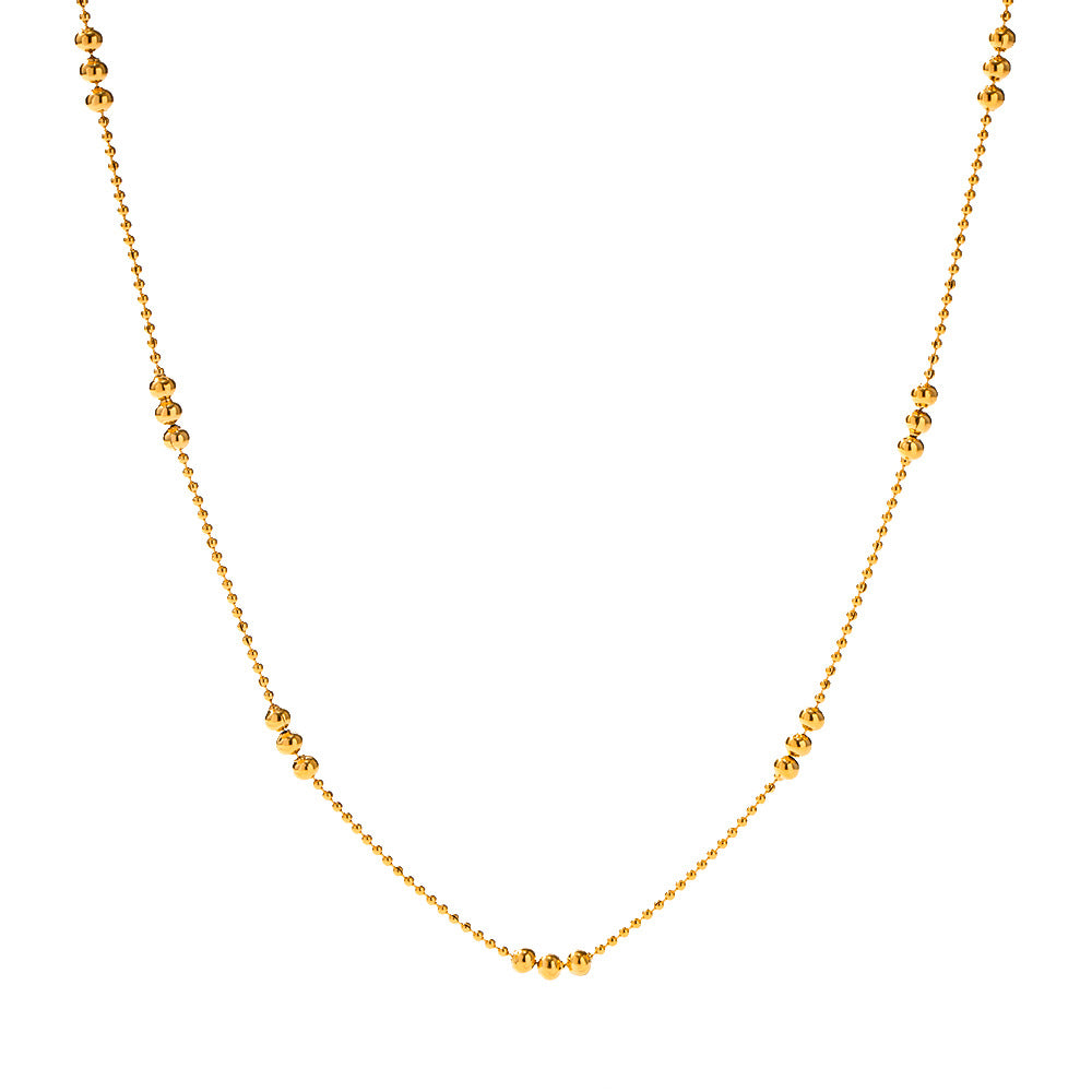 Damen Halskette mit schimmernden goldenen Kugeldetails Shop Nory