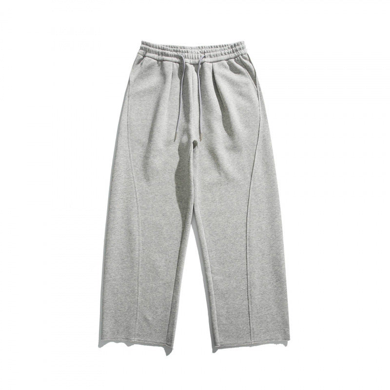 Unisex Weite Baumwoll-Fleece-Jogginghose mit Tunnelzug, Dekorativen Vordernähten und Raw-Saum Shop Nory