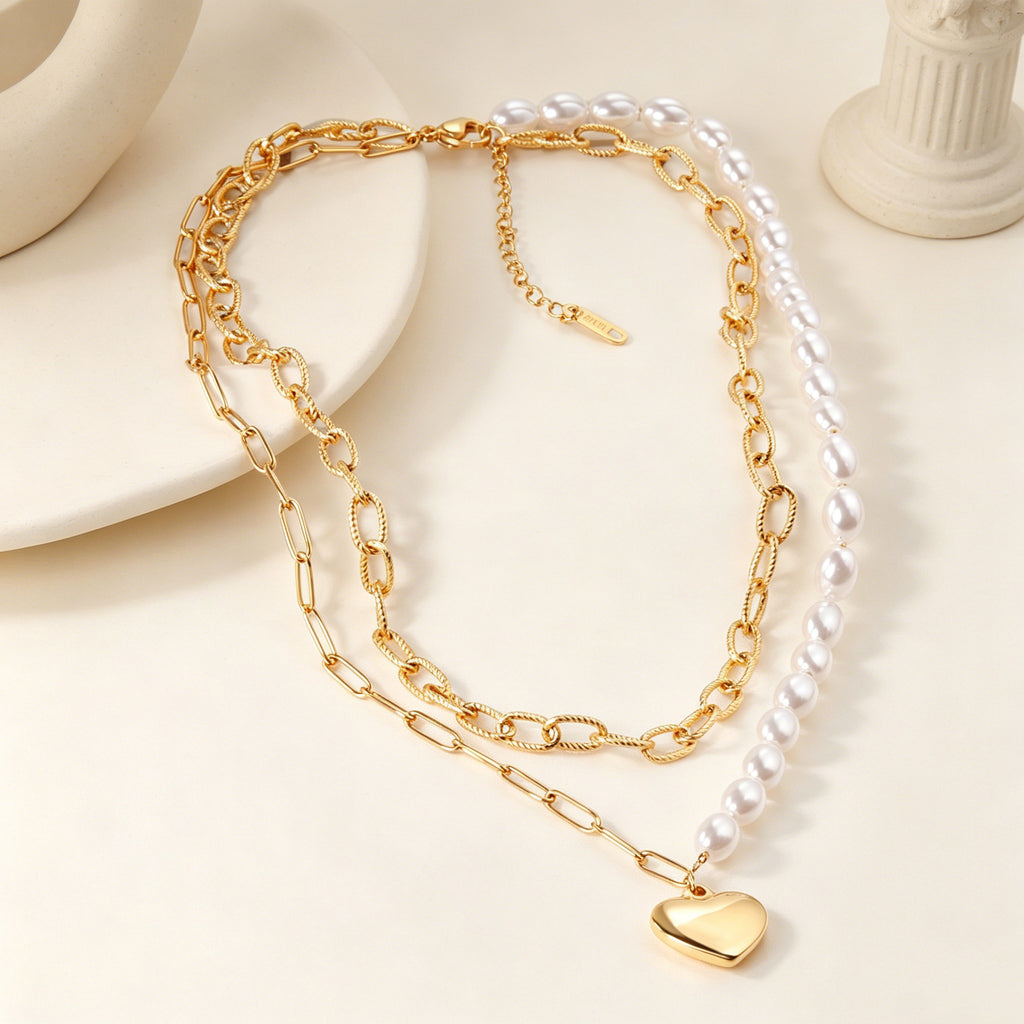 Damen Halskette mit mehrlagigem Design aus Edelstahl und goldplattiertem Herzanhänger Shop Nory