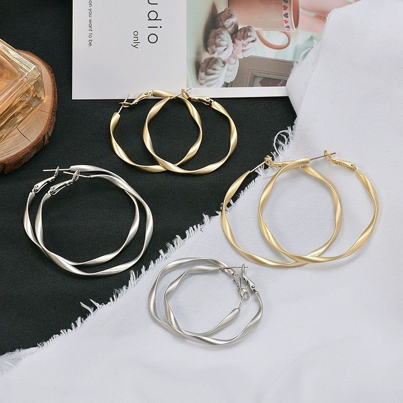 Damen Ohrstecker im modernen Wellen-Design Shop Nory