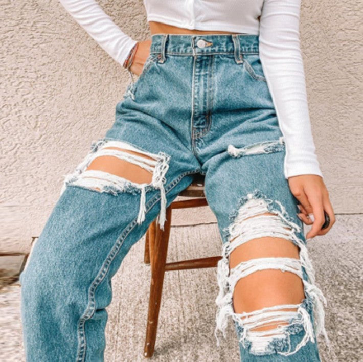 Damen Hochtaillierte Ripped Jeans mit fransigen Details