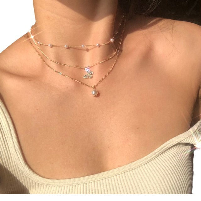 Damen mehrlagige Halskette mit eleganten Perlen und schimmernden Anhängern Shop Nory