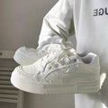 Damen Sneakers mit texturiertem Obermaterial und dämpfender Sohle