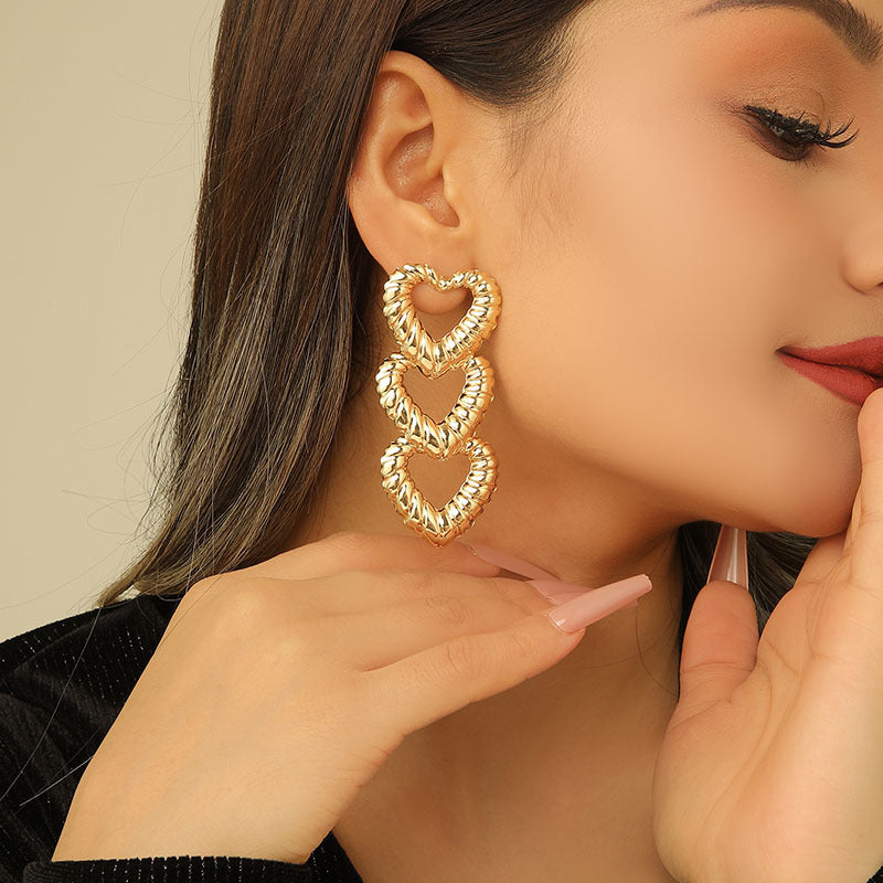 Damen Hängende Ohrringe mit geschwungenem Herzdesign Shop Nory