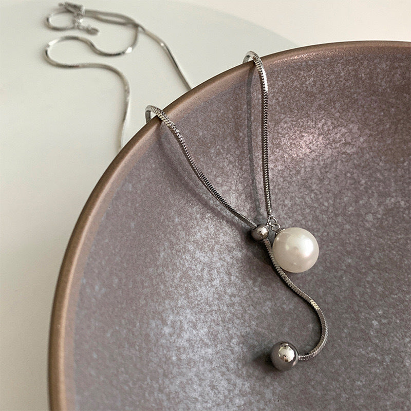 Damen Halskette mit elegantem Perlenanhänger und zartem Gliederdesign Shop Nory