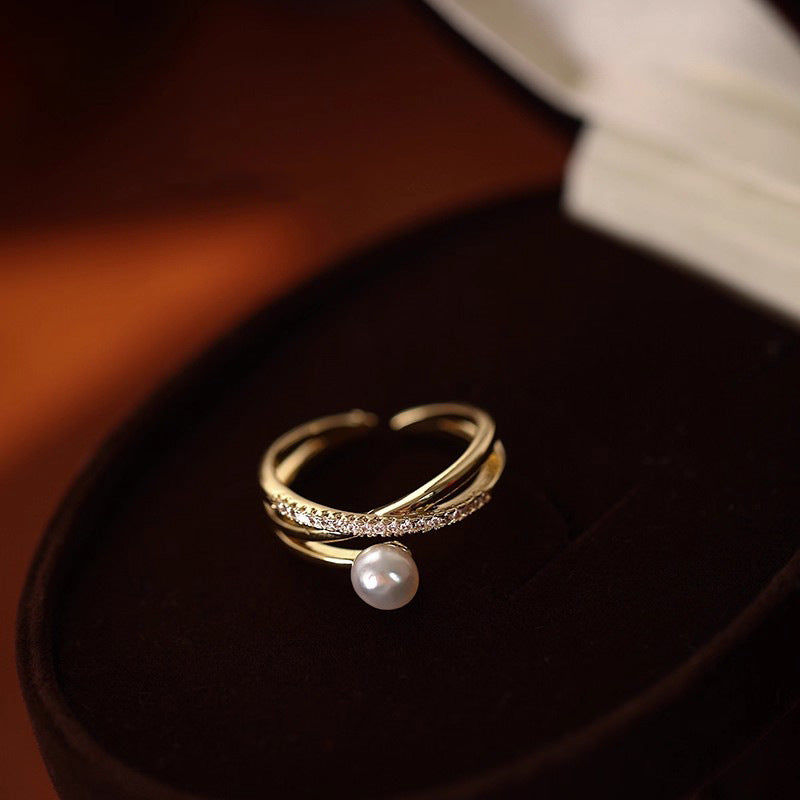 Damen Zierlicher Ring mit geschwungenem Design und Perle Shop Nory