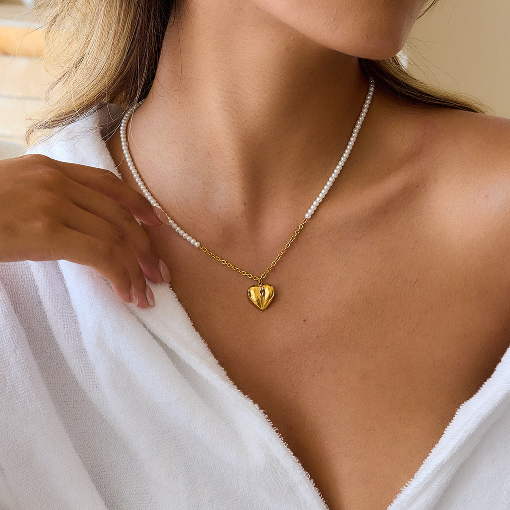 Damen Halskette mit herzförmigem Anhänger und eleganter Perlenverzierung Shop Nory