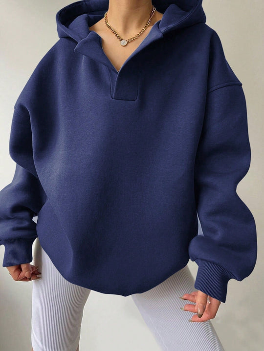 Damen Oversized Hoodie mit kurzem Kragen und praktischen Seitentaschen