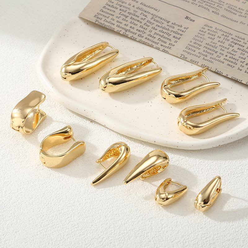 Damen Ohrringe mit elegantem, geschwungenem Design Shop Nory