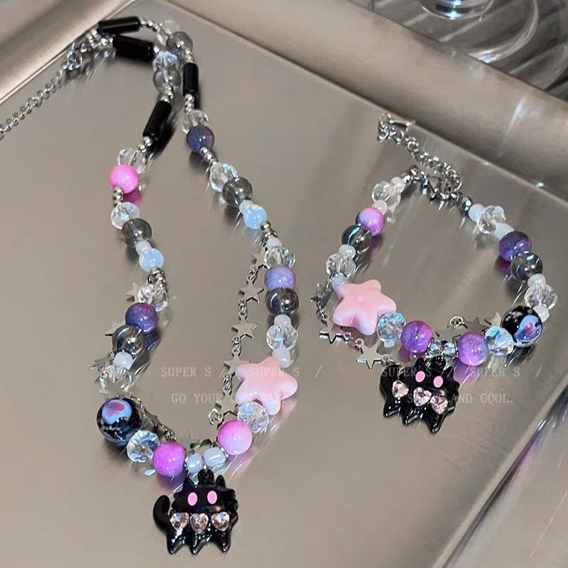 Damen Armband mit bunten Kristallen und verspieltem Charme Shop Nory