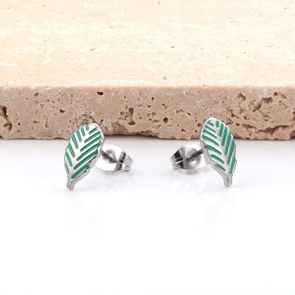 Damen Ohrstecker mit kunstvollem Blattmotiv aus hochwertigem Edelstahl und goldplattierter Oberfläche Shop Nory