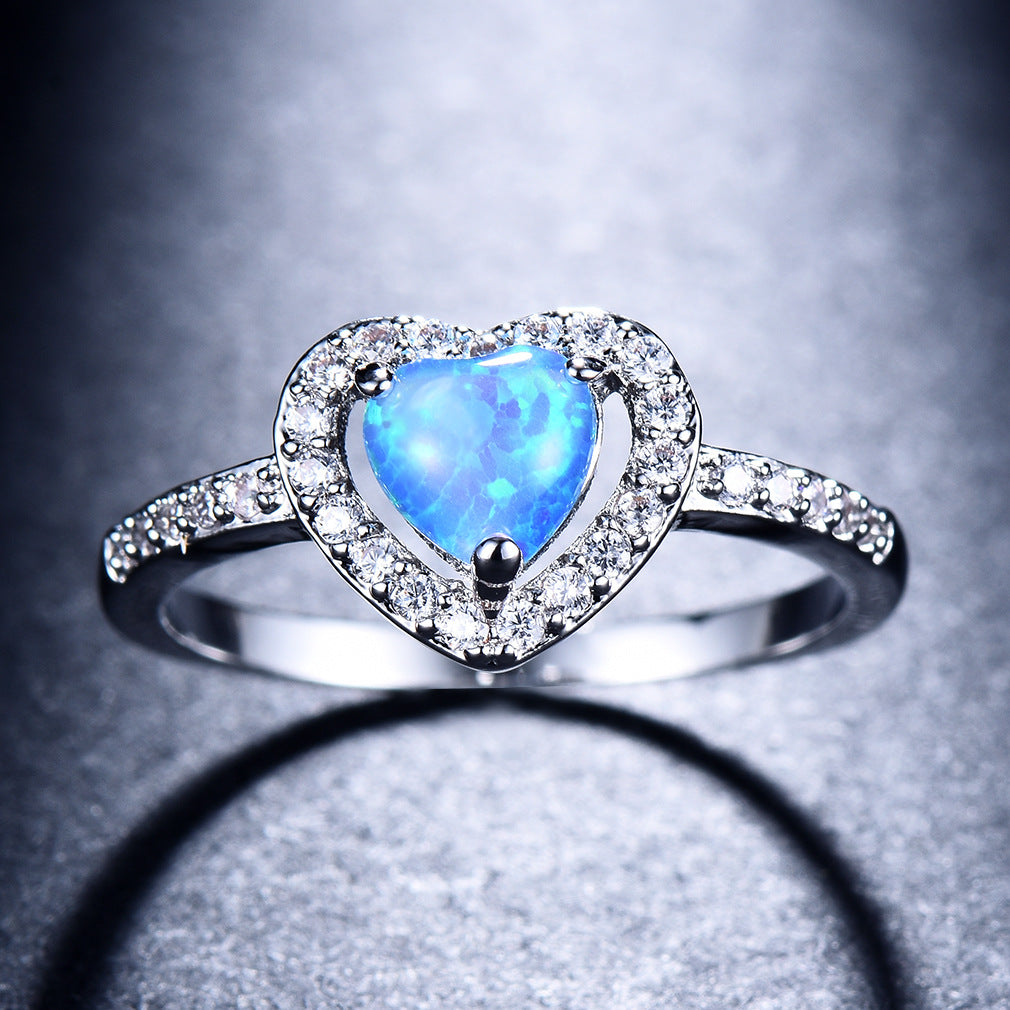 Damen Ring mit herzförmigem Opal und funkelnden Zirkonia-Verzierungen Shop Nory
