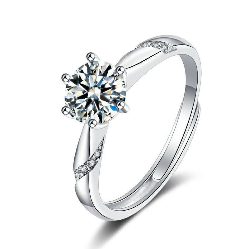 Damen eleganter Ring mit funkelndem Solitär und verspieltem Zirkonia-Besatz Shop Nory