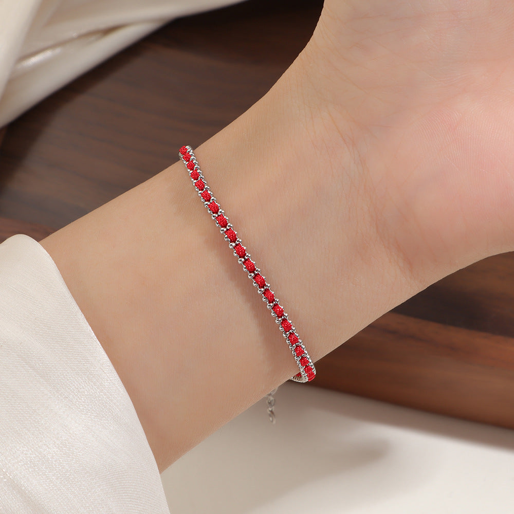 Damen romantisches Armband mit funkelnden roten Zirkonia Shop Nory