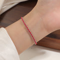 Damen romantisches Armband mit funkelnden roten Zirkonia Shop Nory