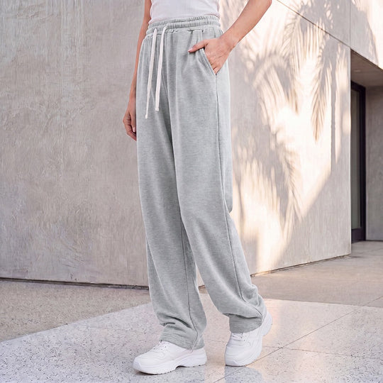 Damen nan weite Loungepalazzo-Hose mit hohem Komfortbund, Kordelzug, seitlichen Eingrifftaschen und dekorativer Seitennaht Shop Nory