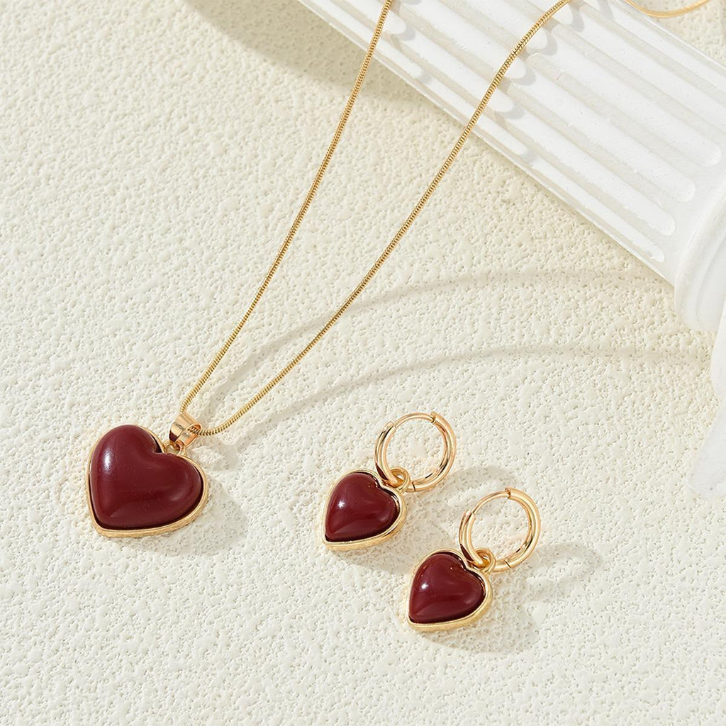 Damen Schmuckset mit herzförmigen Anhängern und goldfarbener Kette Shop Nory