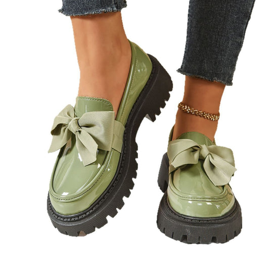 Damen Glänzende Plateau-Loafer mit übergroßer Zierschleife und grober Profilsohle Shop Nory