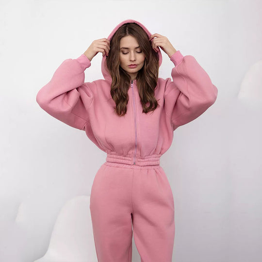 Damen Taillierter Zip-Overall im Loungewear-Stil mit Kapuze, Balloonärmeln und hoher Bundkante Shop Nory