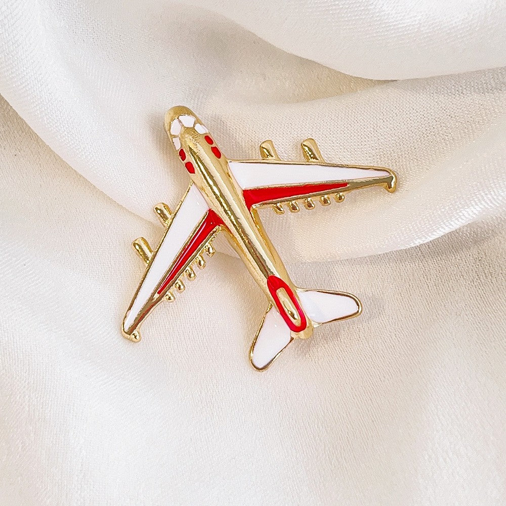 Elegante Flugzeugbrosche mit Kristallbesatz und Sicherem Nadelverschluss