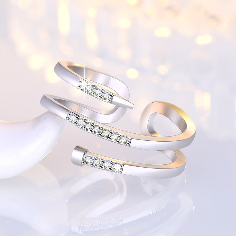 Damenring mit kunstvollem Wellen-Design und funkelnden Zirkonia Shop Nory