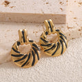 Damen Ohrringe mit elegantem, skulpturalem Design Shop Nory