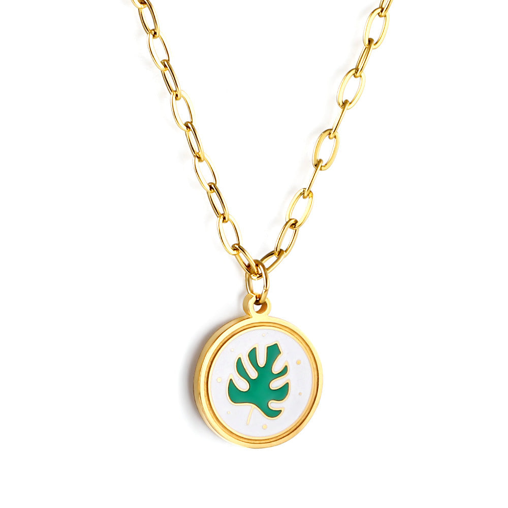 Damen Halskette mit kunstvollem Blätteranhänger aus goldplattiertem Edelstahl Shop Nory