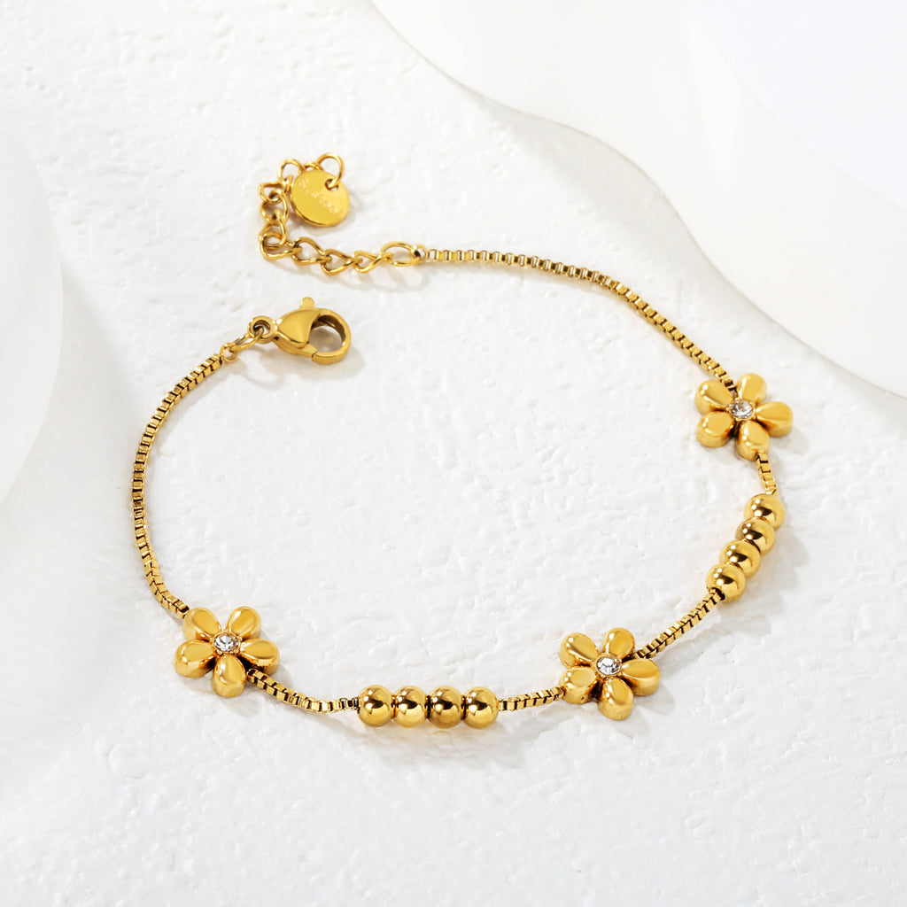 Damen zartes Armband mit floralen Elementen und funkelnden Akzenten Shop Nory