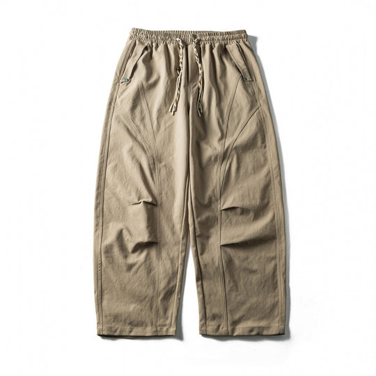 Unisex Weite Cropped-Hose mit Tunnelzug, elastischem Bund und markanten Nahtpaneelen Shop Nory