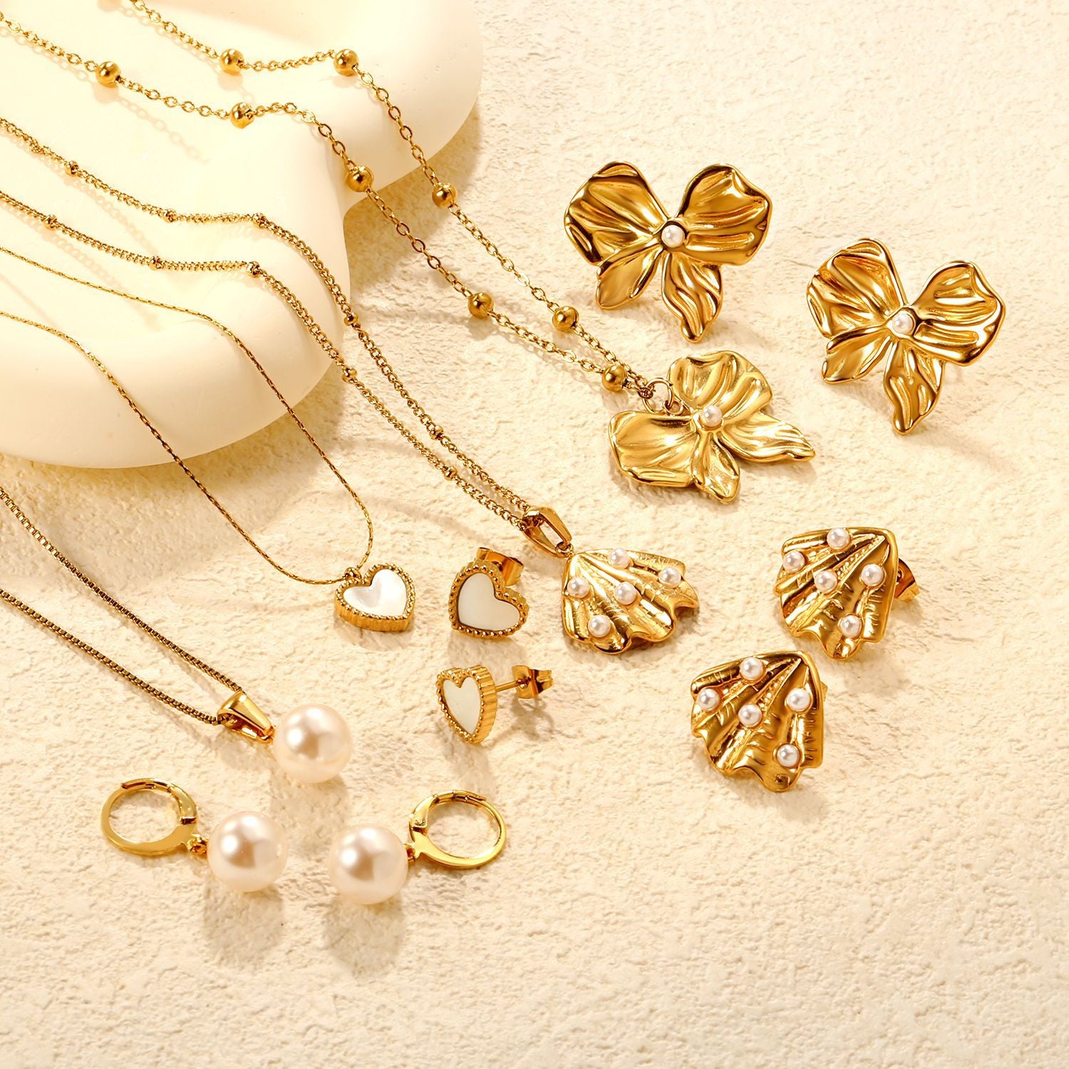 Damen Schmuckset mit Muschel-Anhänger und Perlenakzenten Shop Nory