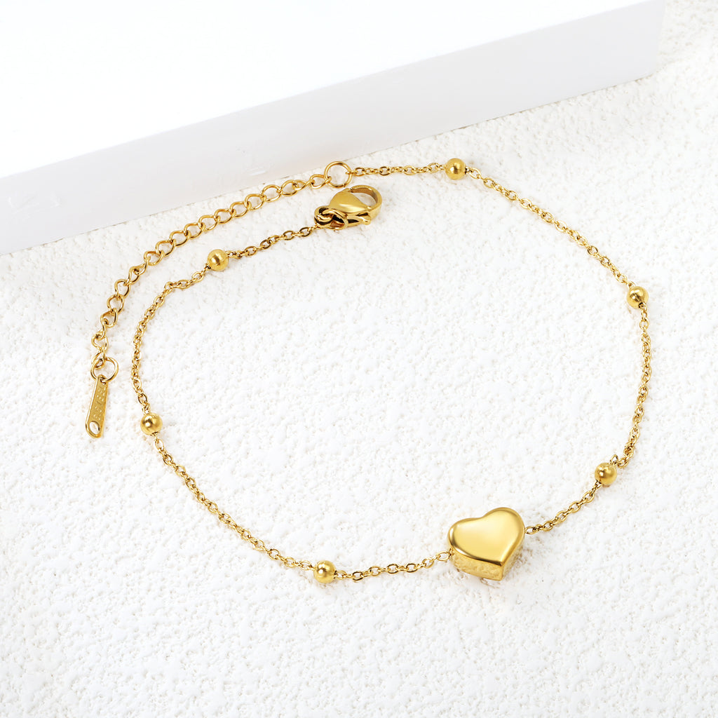 Damen Armband mit herzförmigem Anhänger und eleganten Kettendetails Shop Nory