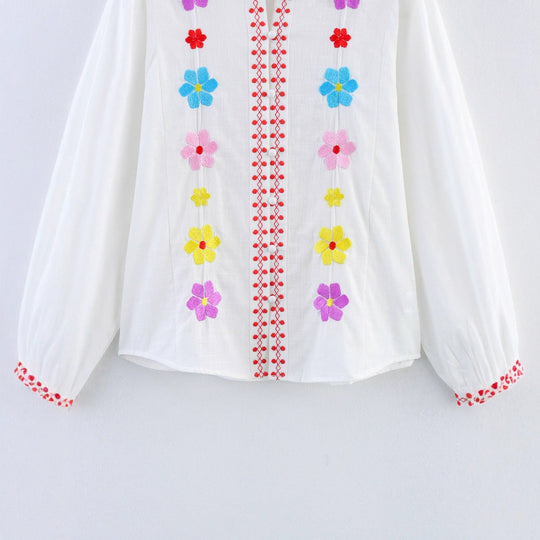 Damen Bluse mit bunten Stickereien und romantischem Rüschendesign