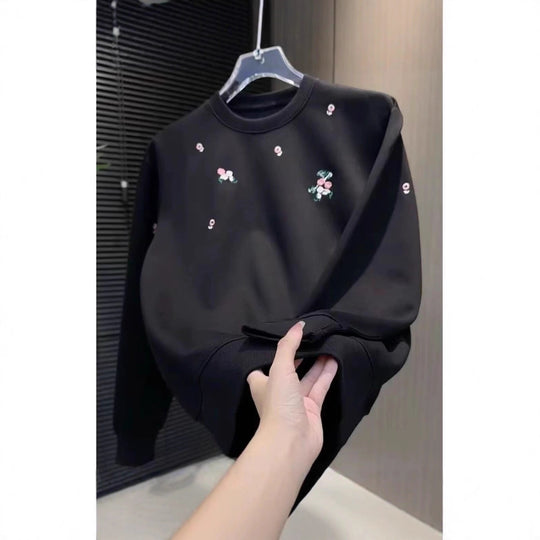 Damen Eleganter Oversized Pullover mit floralem Stickdesign Shop Nory