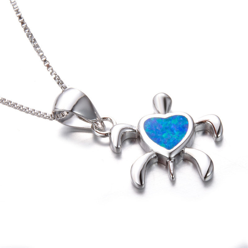Damen Schmuckanhänger in Schildkrötenform mit herzförmigem Opal-Shop Nory