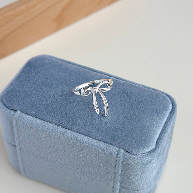 Damenring mit kunstvollem Schleifenmotiv und eleganten Details Shop Nory